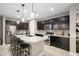 Well-appointed kitchen with granite countertops, stainless steel appliances, and a large island at 12152 W Briles Rd, Peoria, AZ 85383