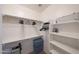 Functional walk-in closet with ample shelving and storage space for easy organization at 13295 N 153Rd Ln, Surprise, AZ 85379