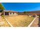 Spacious backyard with block fencing, covered patio and built-in barbeque at 1356 S Mosley Ct, Chandler, AZ 85286