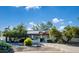 Beautiful home exterior with lush desert landscaping, creating an inviting curb appeal at 13620 N 80Th Pl, Scottsdale, AZ 85260