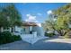 Charming home exterior showcasing desert landscaping and a welcoming front entrance at 13620 N 80Th Pl, Scottsdale, AZ 85260