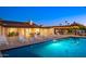 Backyard pool with several lounge chairs and an outdoor dining set near a grill area at 13620 N 80Th Pl, Scottsdale, AZ 85260