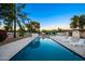 Pool with lounge chairs, beautiful landscaping, and stunning mountain views at 13620 N 80Th Pl, Scottsdale, AZ 85260