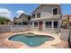 Relaxing backyard featuring a private pool, patio, and privacy fence at 1453 E South Fork Dr, Phoenix, AZ 85048