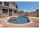 Private backyard oasis with a sparkling pool, perfect for summer fun at 1453 E South Fork Dr, Phoenix, AZ 85048