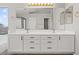 Luxurious bathroom vanity featuring double sinks, and gold fixtures at 1453 E South Fork Dr, Phoenix, AZ 85048