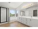 Bathroom featuring a walk-in shower, soaking tub, and double sink vanity at 1453 E South Fork Dr, Phoenix, AZ 85048