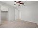 Light filled bedroom featuring a walk-in closet, neutral walls and carpet at 1453 E South Fork Dr, Phoenix, AZ 85048