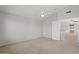 Neutral bedroom featuring carpet, ceiling fan, and access to the second story at 1453 E South Fork Dr, Phoenix, AZ 85048