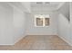 Open dining area with large window and modern chandelier at 1453 E South Fork Dr, Phoenix, AZ 85048