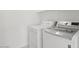 Clean and ready to use laundry room with modern, front-loading machines at 1453 E South Fork Dr, Phoenix, AZ 85048