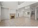 Spacious open-plan living area with tile flooring and fireplace at 1453 E South Fork Dr, Phoenix, AZ 85048