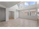 Bright living room with large windows and tile flooring offers a spacious atmosphere at 1453 E South Fork Dr, Phoenix, AZ 85048