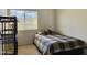 This cozy bedroom features a neutral color scheme and natural light creating a peaceful atmosphere at 16242 S 12Th Pl, Phoenix, AZ 85048