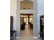 An open-concept interior with a view into the Gathering and dining rooms, enhancing the feeling of flow and connectivity at 16242 S 12Th Pl, Phoenix, AZ 85048