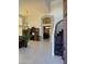 Inviting entryway featuring tile flooring, a staircase, and views into the living room, creating a sense of spaciousness at 16242 S 12Th Pl, Phoenix, AZ 85048