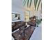 Bright living room featuring a high ceiling, comfortable seating, stylish decor, and large windows at 16242 S 12Th Pl, Phoenix, AZ 85048