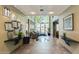 Inviting lobby featuring tile floors, comfortable seating, and bright natural light from large windows at 1701 E Colter St # 491, Phoenix, AZ 85016