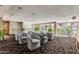Comfortable lounge area features ample seating, neutral walls, and a carpeted floor at 1701 E Colter St # 491, Phoenix, AZ 85016