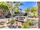 Exterior shot of the Biltmore Square community sign with landscaping and trees at 1701 E Colter St # 491, Phoenix, AZ 85016