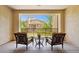 Outdoor balcony with comfortable seating overlooking a lush green landscape at 17850 N 68Th St # 2138, Phoenix, AZ 85054
