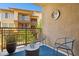Cozy balcony with seating and a view of the complex at 17850 N 68Th St # 2138, Phoenix, AZ 85054