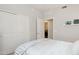 Bright bedroom with a closet, an ensuite bathroom, and plush carpeting at 17850 N 68Th St # 2138, Phoenix, AZ 85054