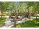 Beautiful community area with picnic tables and lush landscaping at 17850 N 68Th St # 2138, Phoenix, AZ 85054