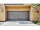 Attached two-car garage with neutral toned door at 17850 N 68Th St # 2138, Phoenix, AZ 85054