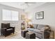Cozy living room with neutral tones, comfortable seating, and natural light at 17850 N 68Th St # 2138, Phoenix, AZ 85054