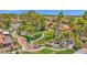 Aerial view of the community featuring lush landscaping, water features, and walkways at 19107 N 94Th Ave, Peoria, AZ 85382