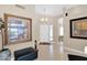Welcoming foyer with neutral walls, tile flooring, and elegant decor at 19107 N 94Th Ave, Peoria, AZ 85382