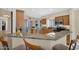 Modern kitchen featuring granite countertops, stainless steel appliances, and wood cabinetry at 19107 N 94Th Ave, Peoria, AZ 85382