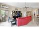 Bright living room featuring tile floors, high ceilings, and natural light, great for entertaining at 19107 N 94Th Ave, Peoria, AZ 85382