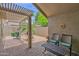 Charming covered patio with desert landscaping, perfect for relaxing and enjoying the outdoors at 19107 N 94Th Ave, Peoria, AZ 85382