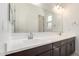 Bathroom featuring double sinks and expansive counter space at 20256 W Monterey Way, Buckeye, AZ 85396