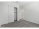 Bright bedroom with sliding door closet offers simple storage at 20256 W Monterey Way, Buckeye, AZ 85396