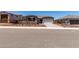 Charming single-story home with low-maintenance desert landscaping and a two-car garage at 20256 W Monterey Way, Buckeye, AZ 85396
