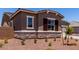Beautiful single-story home with tasteful exterior finishes and low-maintenance landscaping at 20256 W Monterey Way, Buckeye, AZ 85396