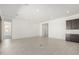 Spacious living area with tile floors, recessed lighting, and an open layout at 20256 W Monterey Way, Buckeye, AZ 85396