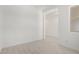 Image of a room with tile flooring and white walls, showcasing a versatile space with a connecting hallway at 20256 W Monterey Way, Buckeye, AZ 85396