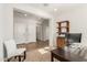 Bright office space with neutral walls, carpet and tile flooring, with white baseboards and trim at 20783 W Pasadena Ave, Buckeye, AZ 85396