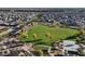 An aerial view of the park, showcasing the walking paths, green spaces, and basketball court at 22964 E Via Del Sol --, Queen Creek, AZ 85142
