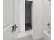 Bright bathroom featuring an open doorway and the shower area with the tub and white walls at 22964 E Via Del Sol --, Queen Creek, AZ 85142