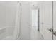 Bright bathroom with a tub and white shower curtain, complemented by sleek, modern design at 22964 E Via Del Sol --, Queen Creek, AZ 85142