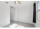 Bright bedroom highlighting a ceiling fan and window with curtain at 22964 E Via Del Sol --, Queen Creek, AZ 85142