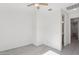Light-filled bedroom featuring modern tile floors and neutral paint at 22964 E Via Del Sol --, Queen Creek, AZ 85142