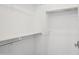 Walk-in closet with metal rods for clothes, offering convenient storage at 22964 E Via Del Sol --, Queen Creek, AZ 85142