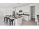 Bright kitchen with stainless steel appliances, a center island, and plenty of storage at 22964 E Via Del Sol --, Queen Creek, AZ 85142