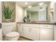 Stylish powder room with modern vanity and elegant decorative touches at 25555 N Windy Walk Dr # 69, Scottsdale, AZ 85255